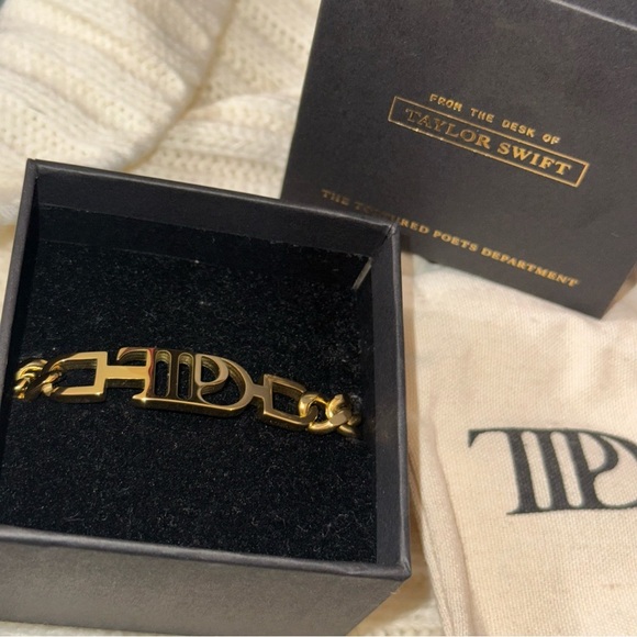 Taylor Swift 'The Tortured Poets
Department" (TTPD) bracelet NWT. L/XL - Picture 6 of 8